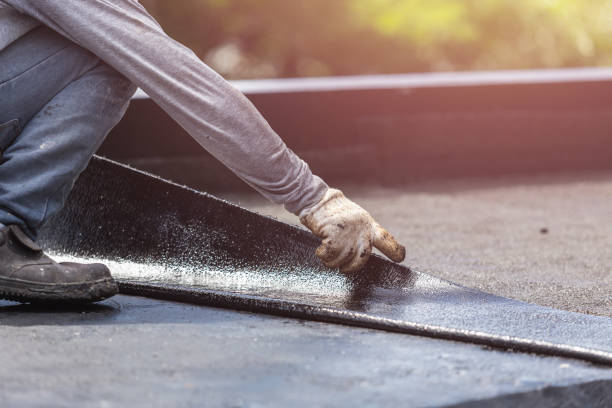 Professional Waterproofing technician working in Carthage, NY